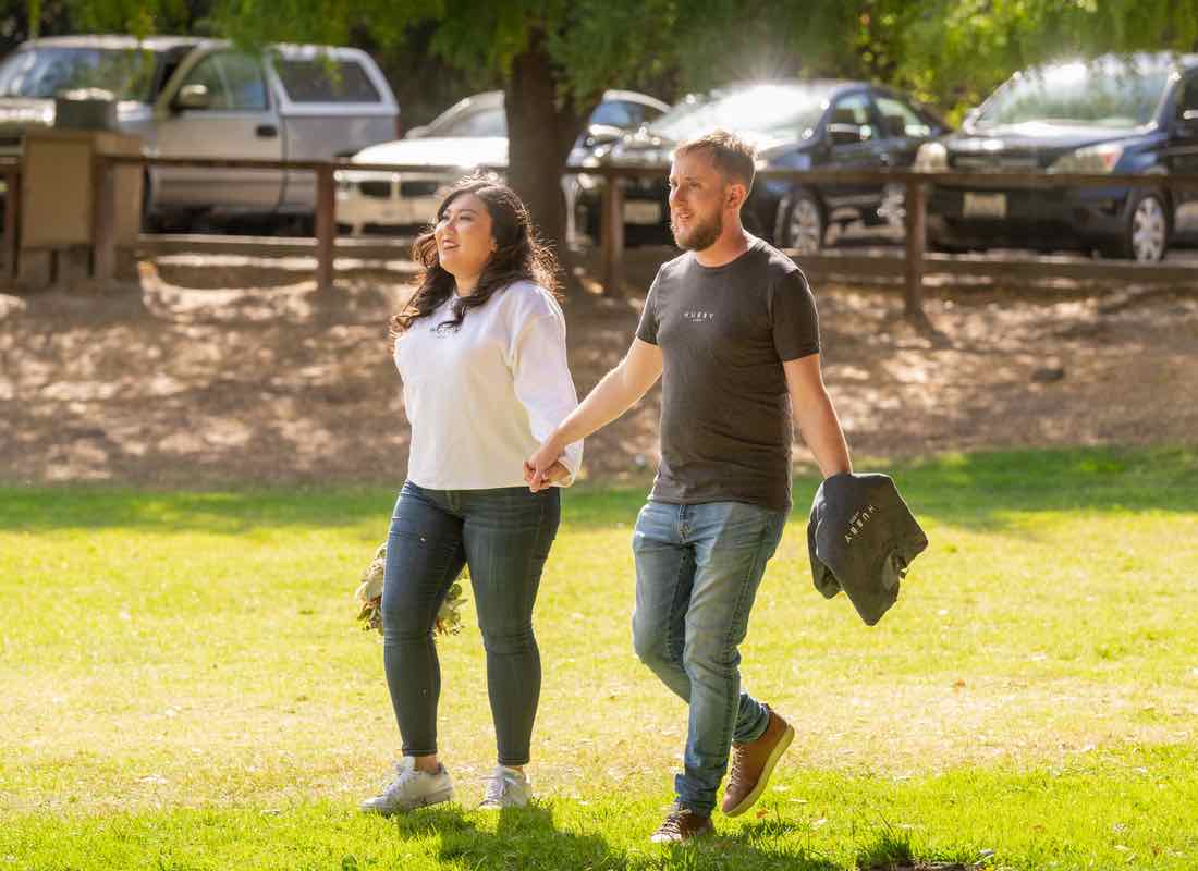 Sean and Leslie walking into the picnic